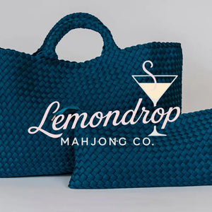 Large teal woven tote bag with matching zip pouch, perfect for stylish storage and everyday use.
