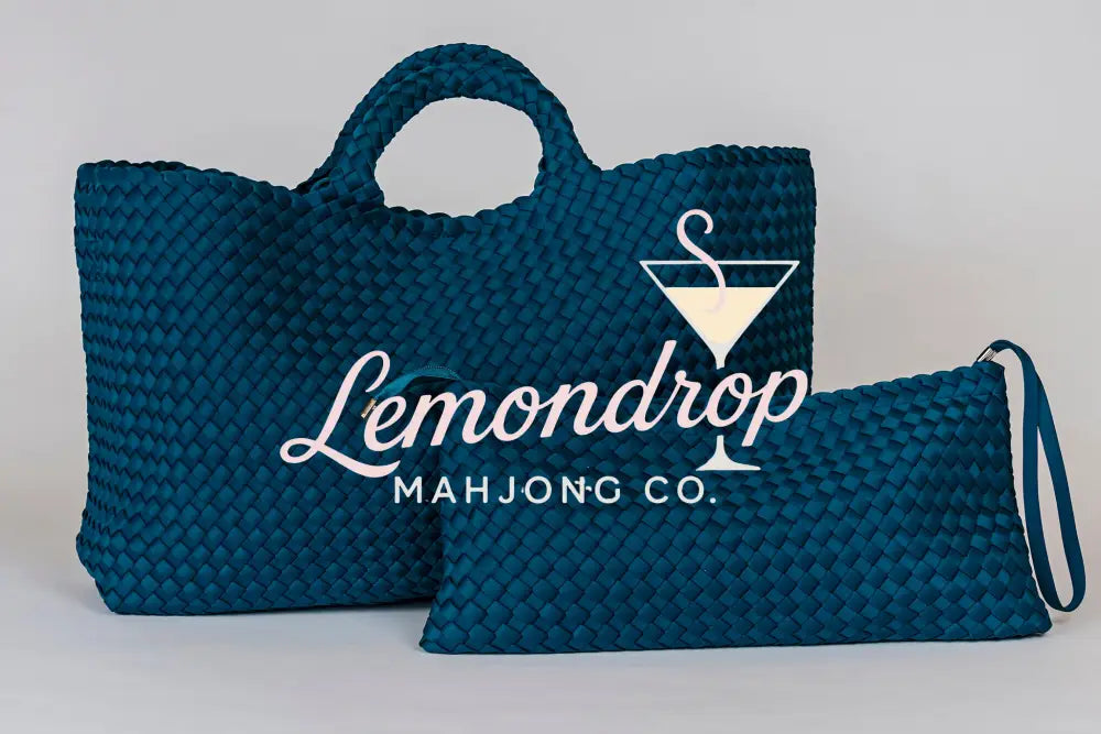 Large teal woven tote bag with matching zip pouch, perfect for stylish storage and everyday use.